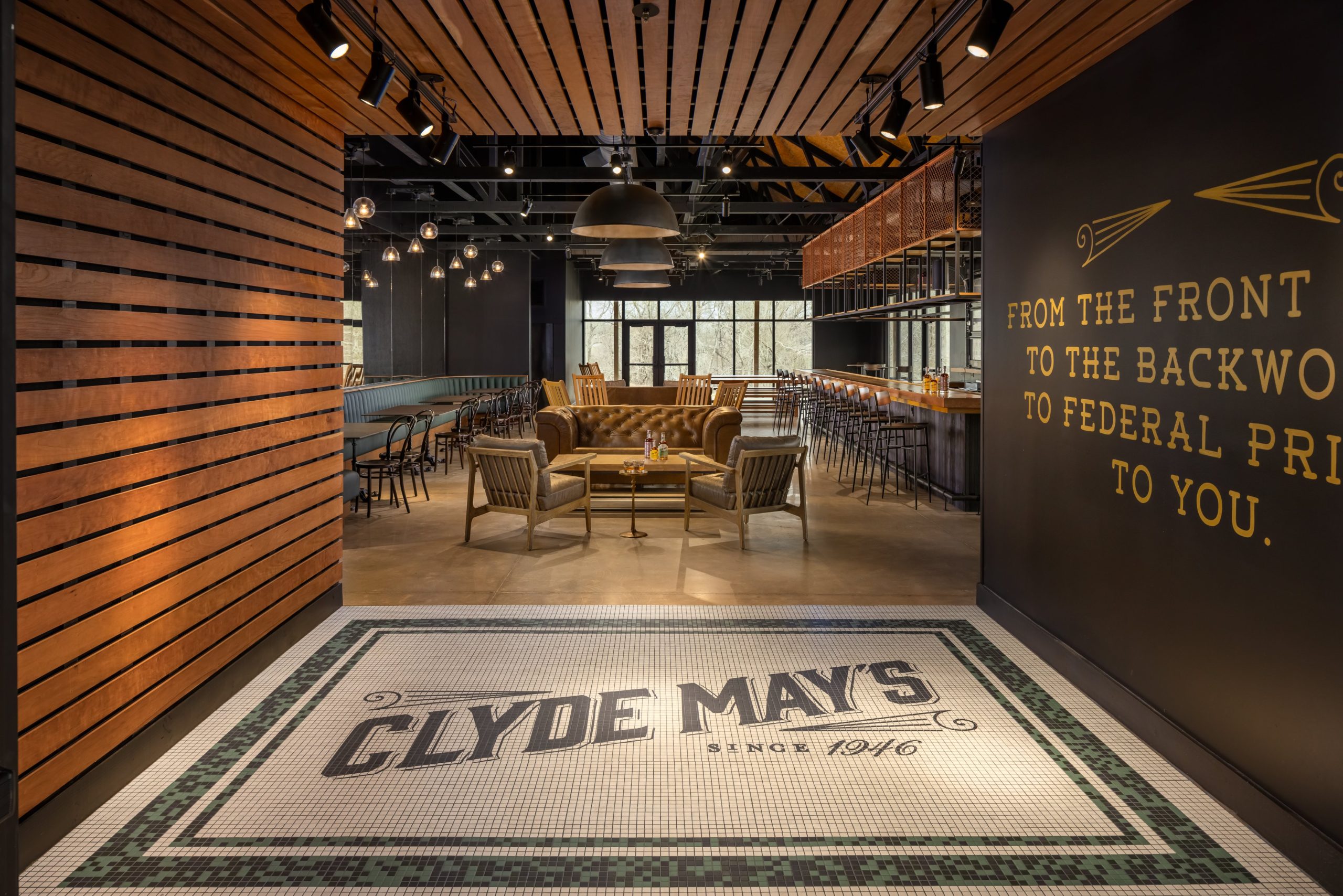 Restaurant entrance with Clyde May's tile floor